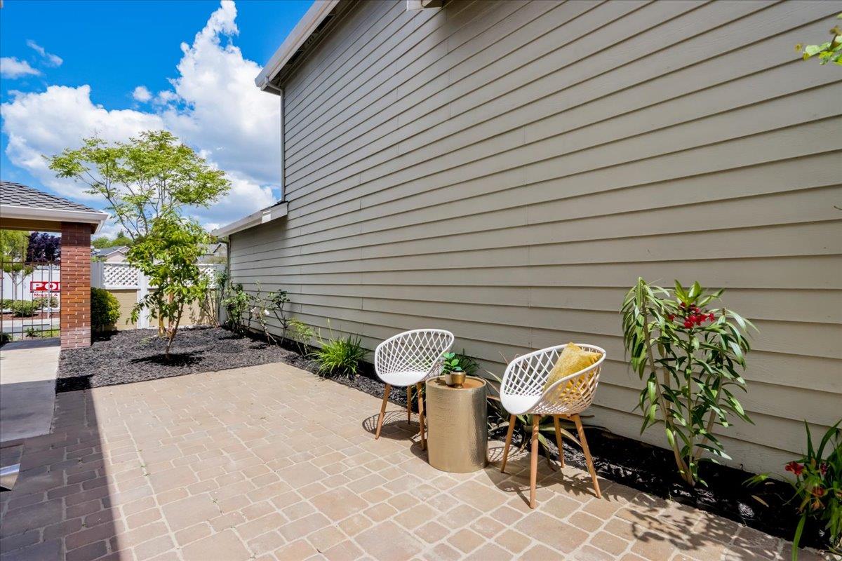 908 Springview Circle San Ramon, CA 94583 - Photo 28 of 31 a potted plant sitting in front of a house