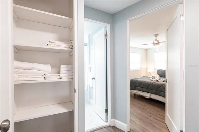 a en suite bathroom with a sink and a mirror
