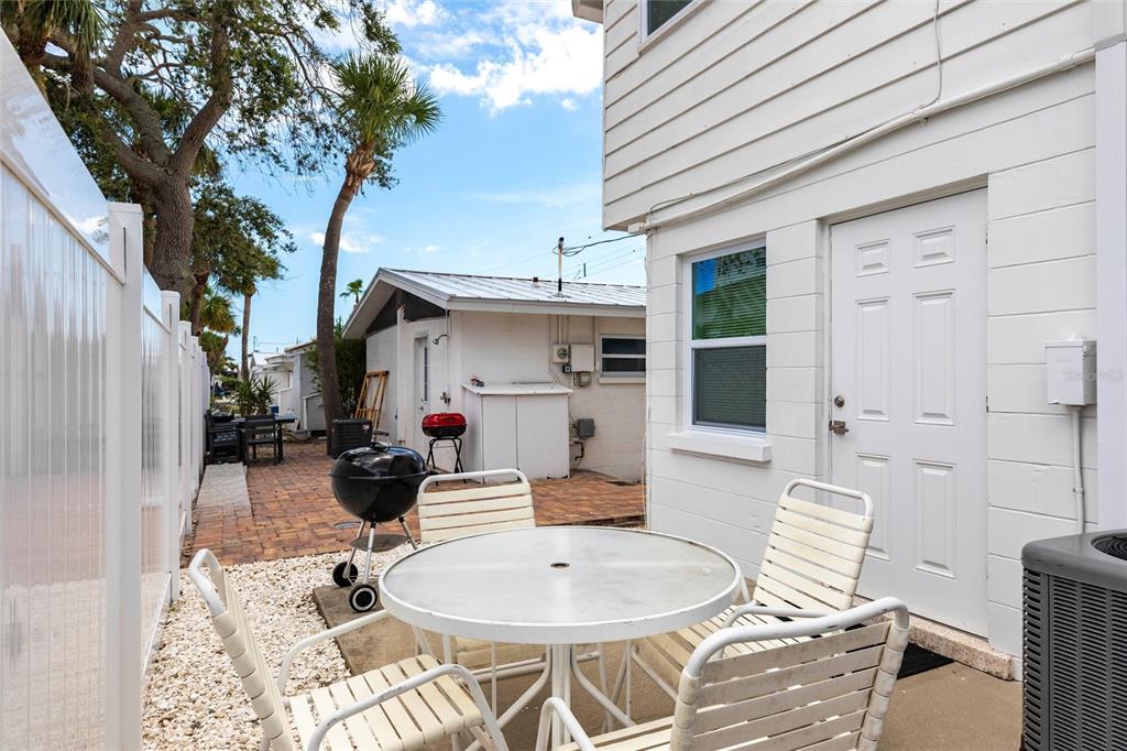 6020 Midnight Pass Road, Unit 49 Sarasota, FL 34242 - Photo 18 of 38 a outdoor space with furniture
