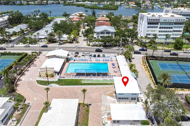 a view of swimming pool with a patio