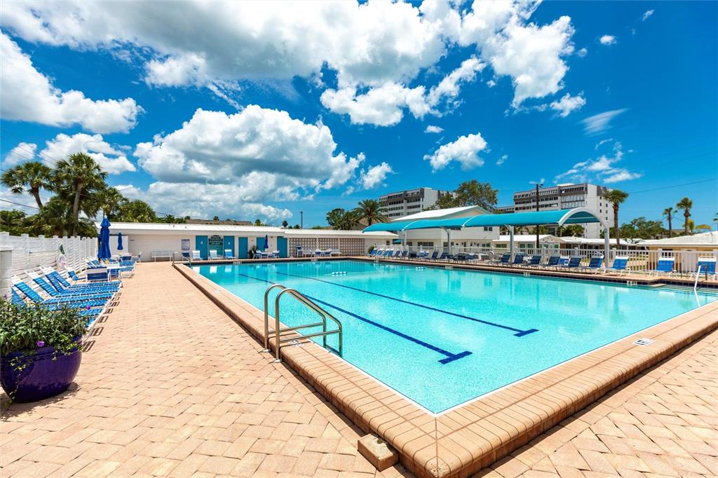 6020 Midnight Pass Road, Unit 49 Sarasota, FL 34242 - Photo 25 of 38 a view of swimming pool with a patio