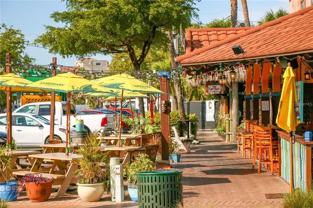 a front view of a house with a backyard
