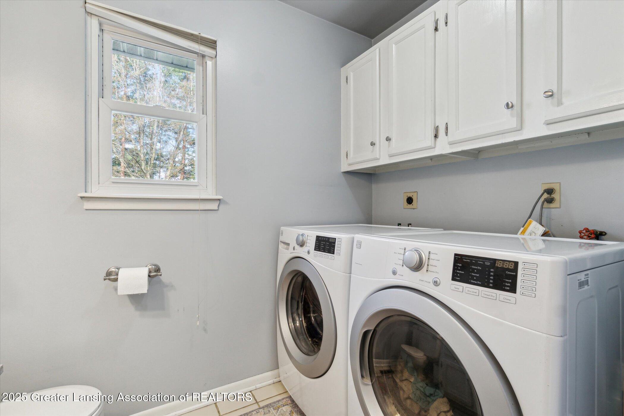 1310 Schavey Road Dewitt, MI 48820 - Photo 25 of 43 Half Bath / Laundry