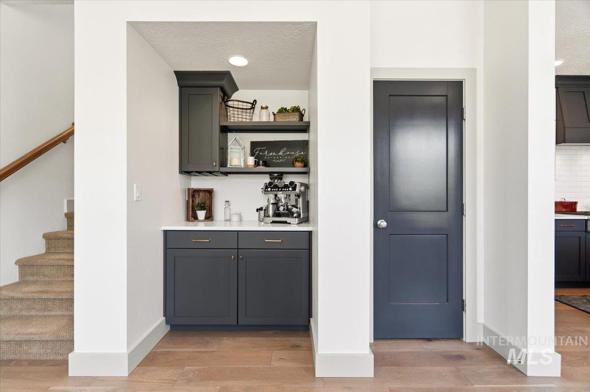 3794 South Single Tree Avenue Boise, ID 83716 - Photo 17 of 50 Built-in cabinetry with a light countertop and open shelving