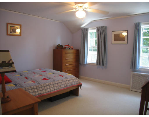 67 Scott Road Belmont, MA 02478 - Photo 11 of 12 a bedroom with a bed and a window