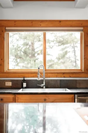 a view of a room that has a bed