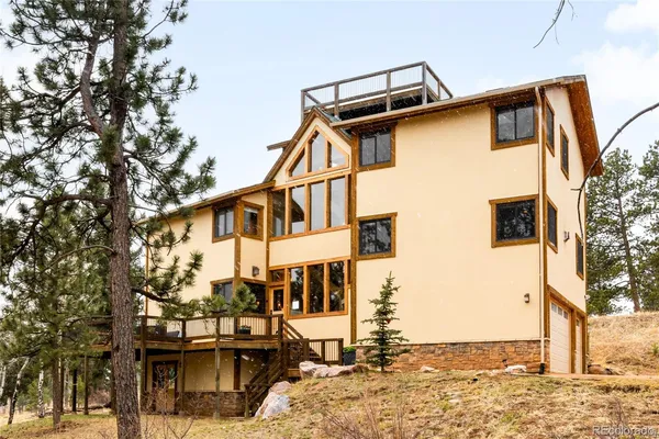 a front view of a house with yard