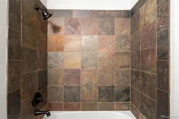 a view of a roof deck with couches