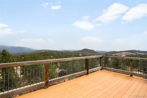 a view of a balcony with lake view