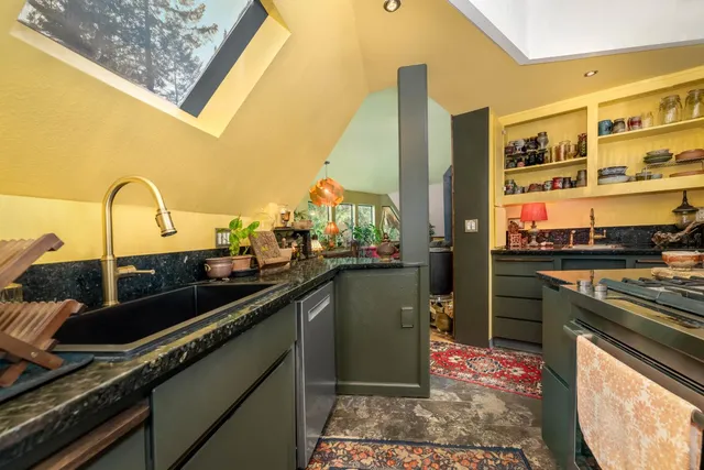 a bedroom with a bed and a mirror