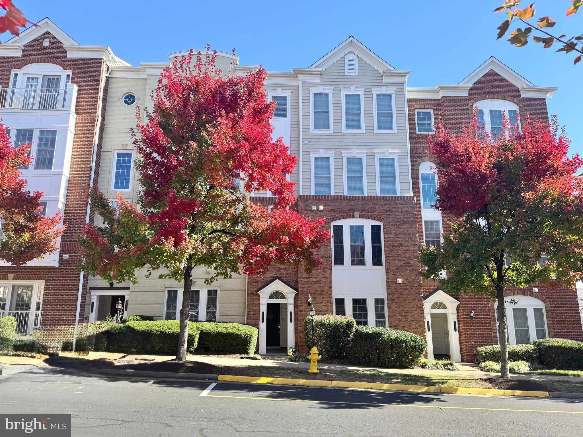 2396 Brookmoor Lane, Unit 401A Woodbridge, VA 22191 - Photo 1 of 26 a front view of a multi story residential apartment building