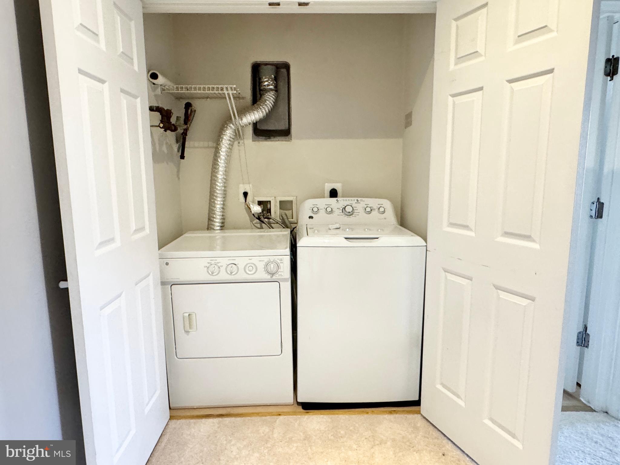 2396 Brookmoor Lane, Unit 401A Woodbridge, VA 22191 - Photo 20 of 26 a utility room with dryer and washer