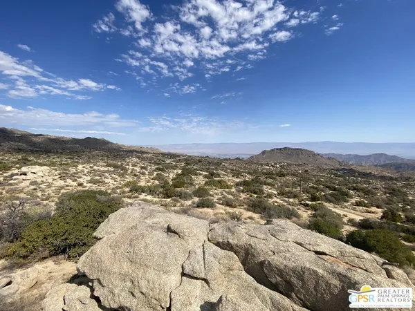 a view of a city with ocean