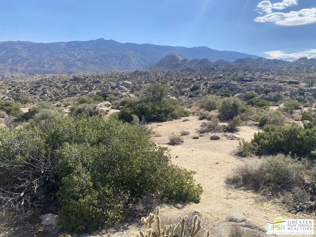 a view of mountain view with lots of trees