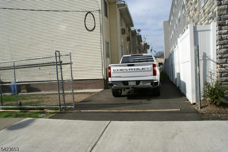 233 Straight Street, Unit 2 Paterson, NJ 07501 - Photo 2 of 9 a view of backyard with cabin