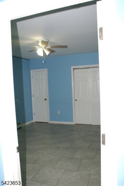 233 Straight Street, Unit 2 Paterson, NJ 07501 - Photo 4 of 9 a view of an empty room