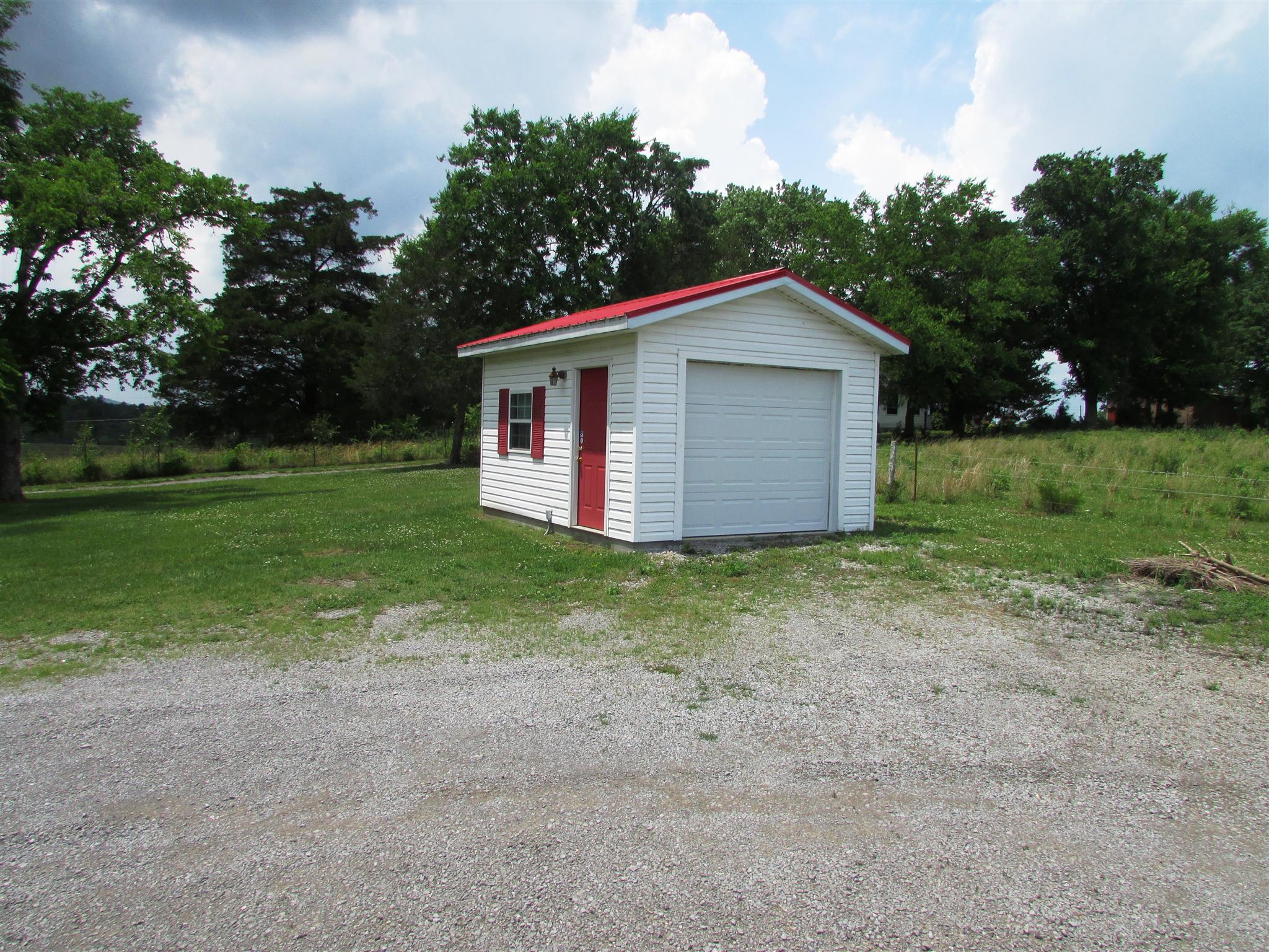 745 New Hope Road Alexandria, TN 37012 - Photo 23 of 30 A single garage behind he home