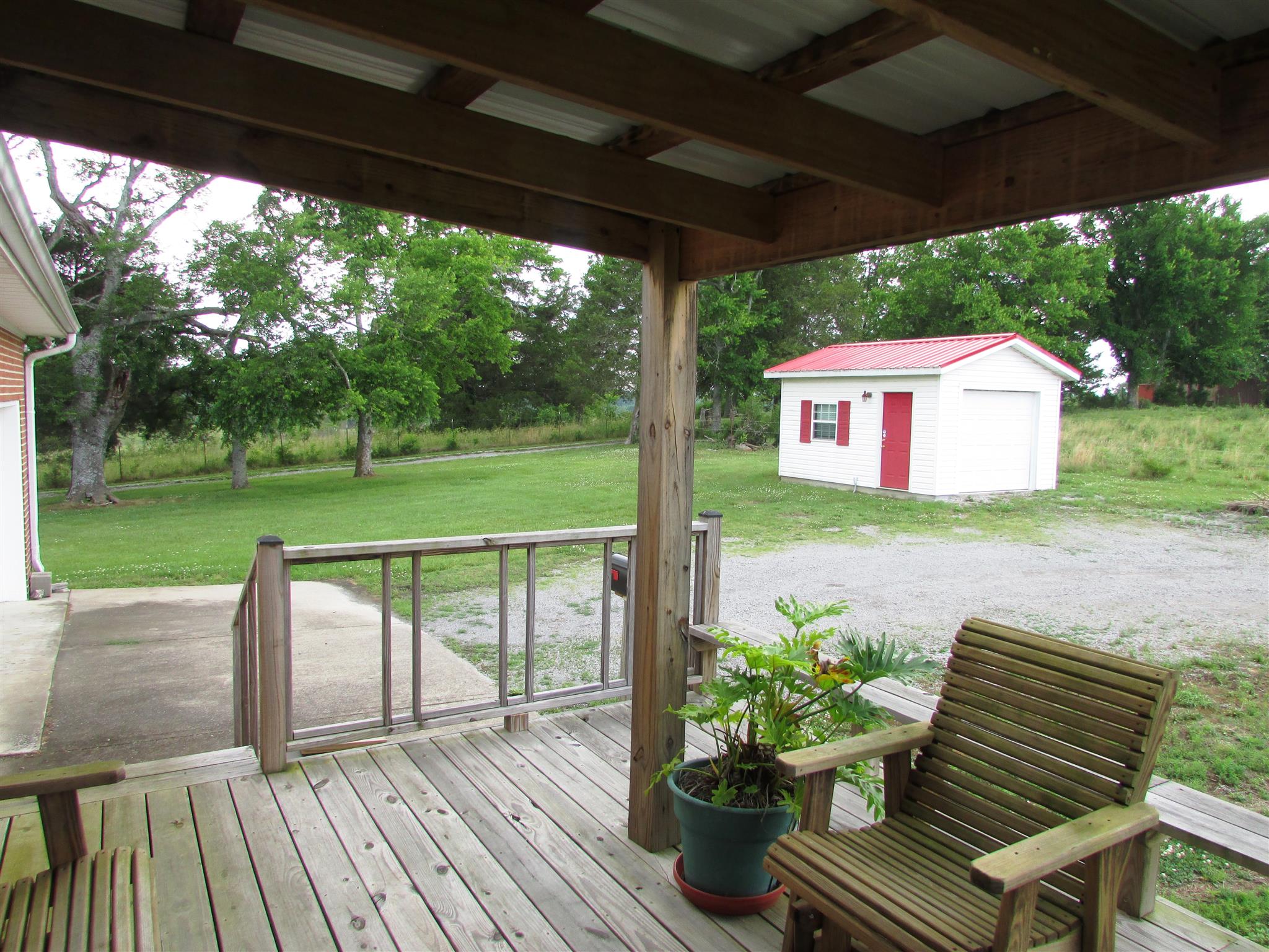 745 New Hope Road Alexandria, TN 37012 - Photo 24 of 30 Back porch view to garage
