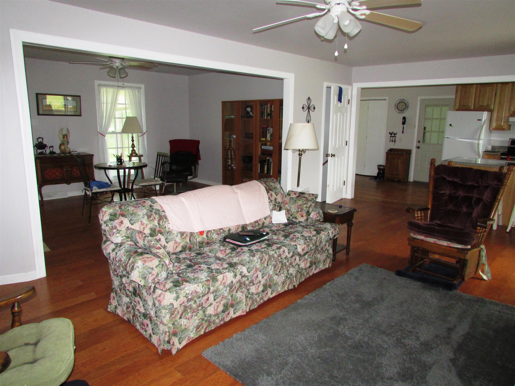 745 New Hope Road Alexandria, TN 37012 - Photo 7 of 30 From the living room toward the den & Kitchen