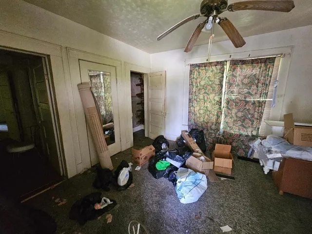 a room with furniture and wooden floor