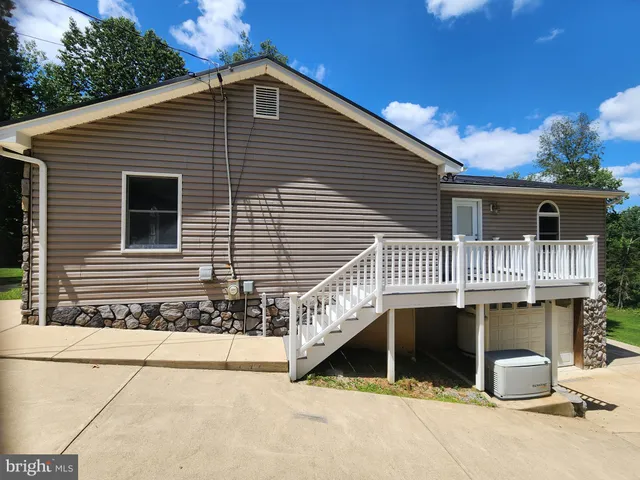 a front view of a house with balcony