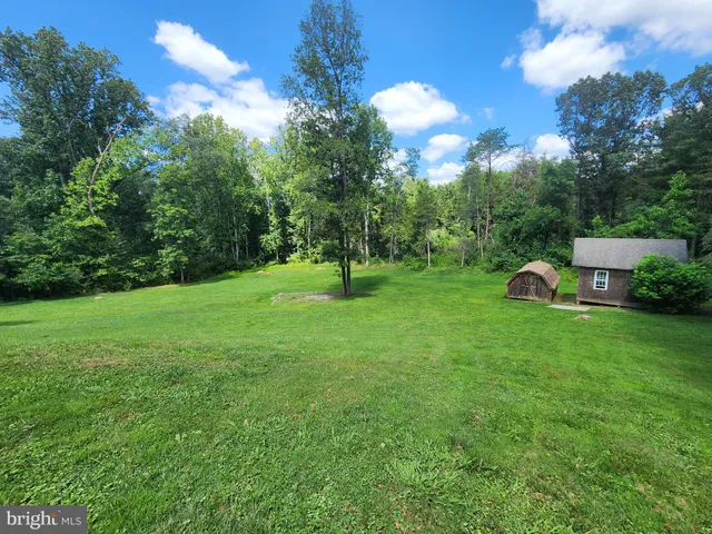 a garden view with a sitting space
