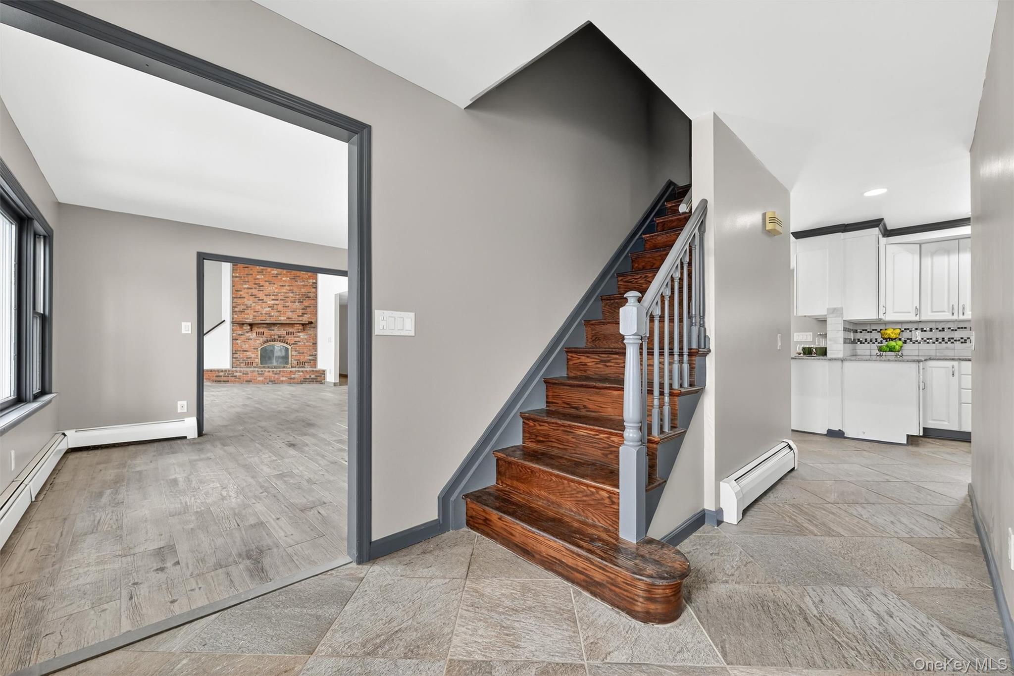285 Hill Road Goshen, NY 10924 - Photo 13 of 49 Front staircase in tiled foyer