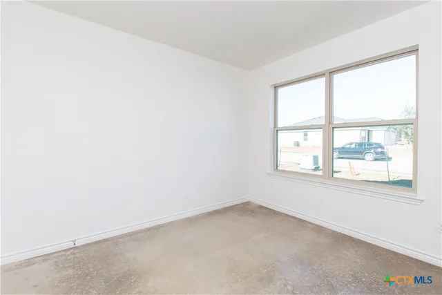 an empty room with a window