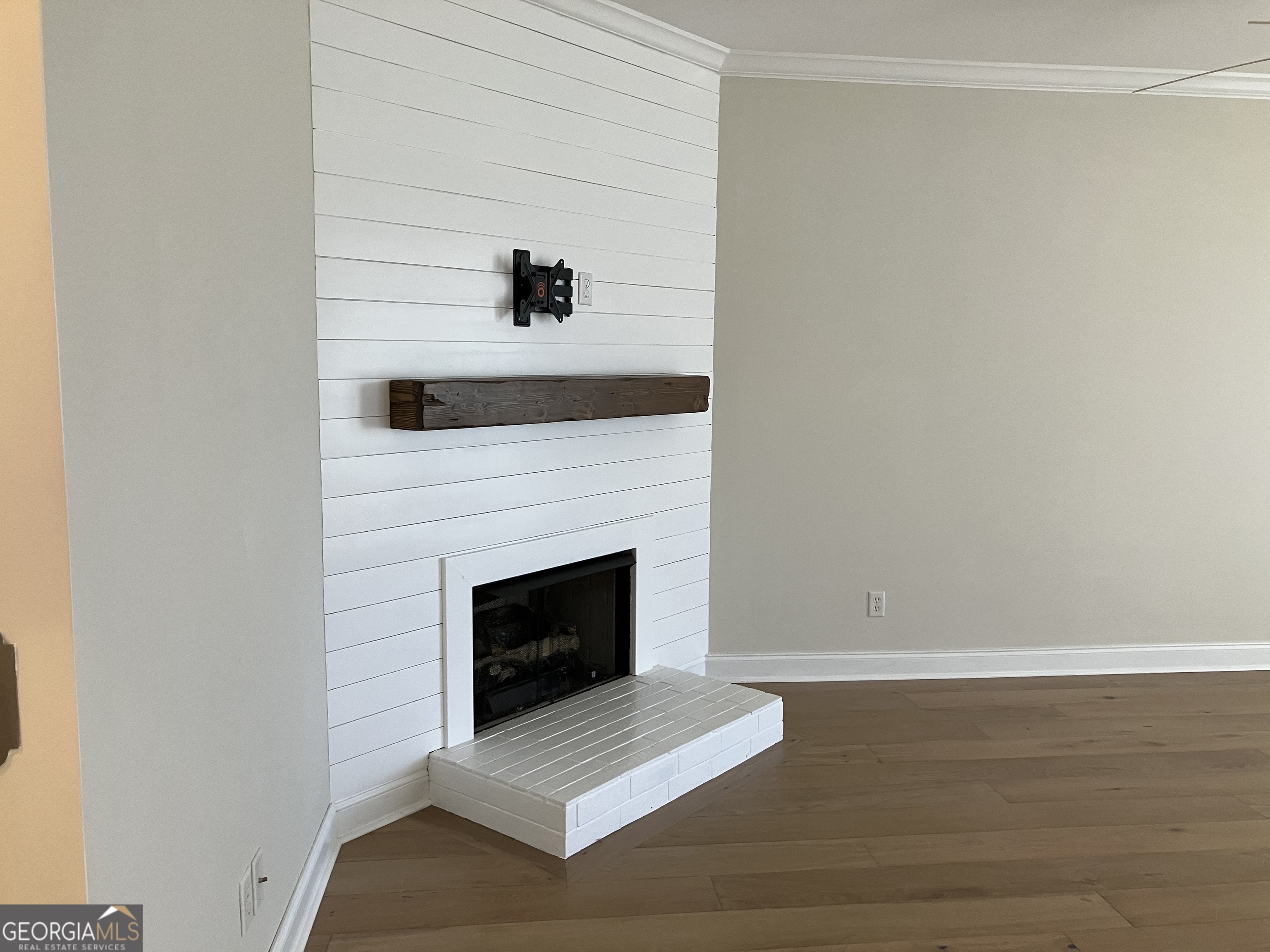 103 Kiln Trail St. Simons Island, GA 31522 - Photo 20 of 81 a view of fireplace and wooden floor