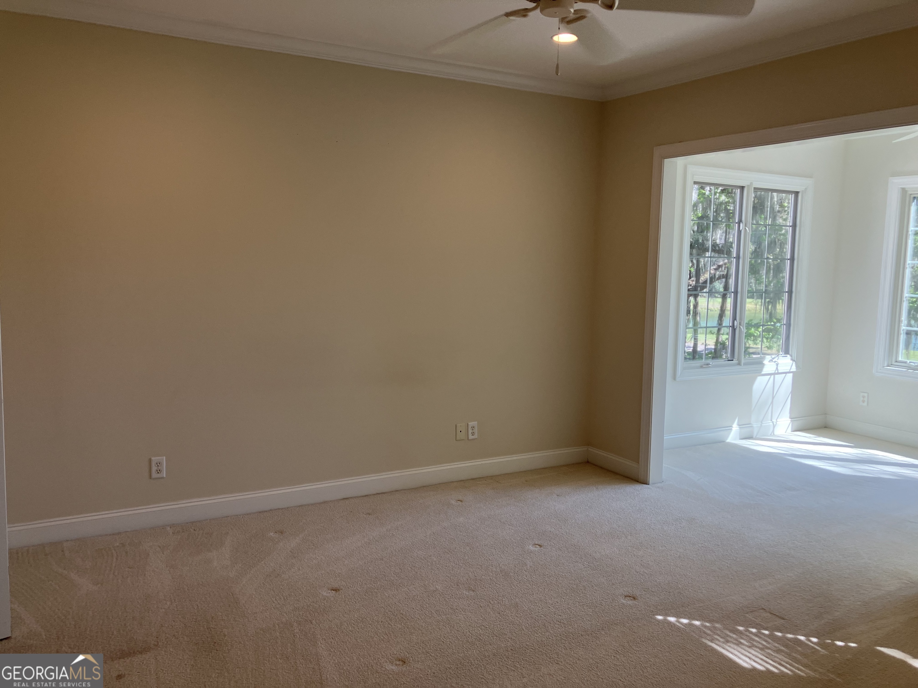 103 Kiln Trail St. Simons Island, GA 31522 - Photo 54 of 81 an empty room with a empty space and windows