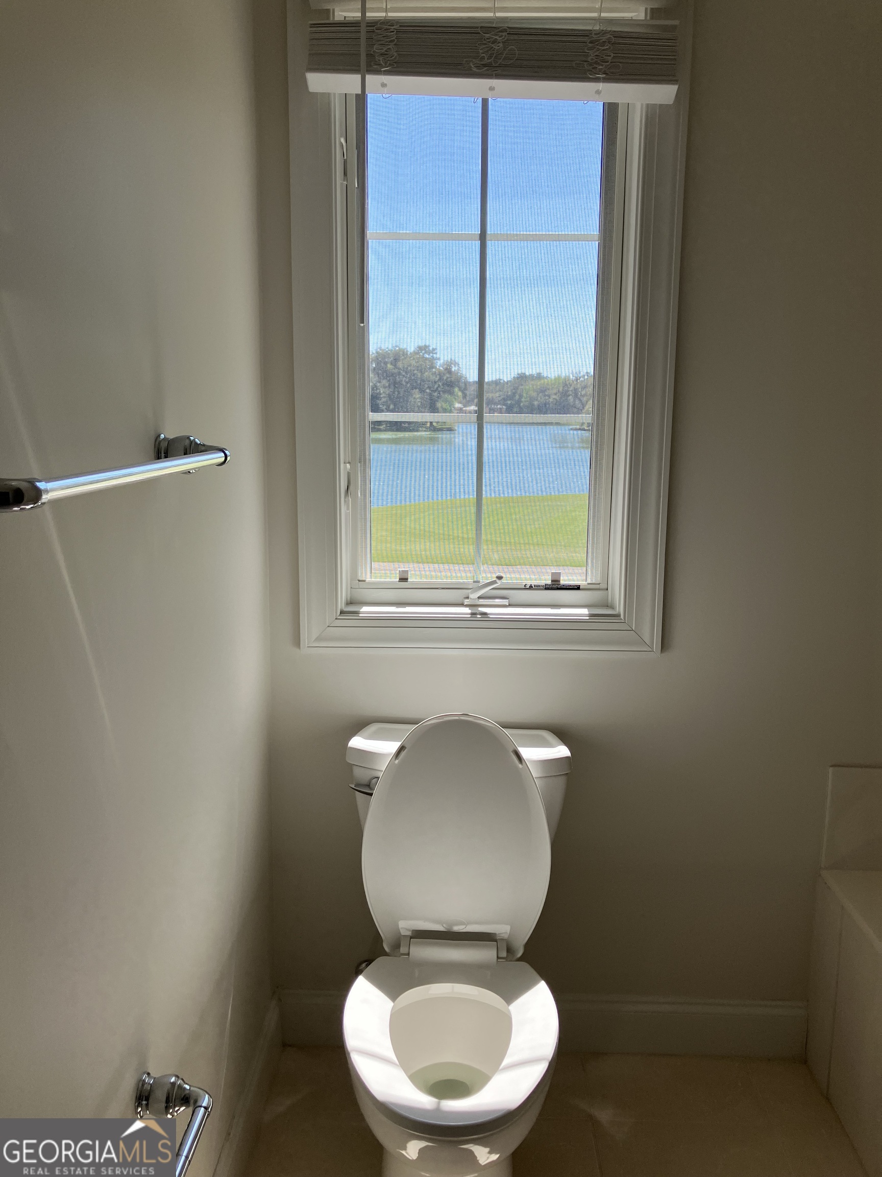 103 Kiln Trail St. Simons Island, GA 31522 - Photo 62 of 81 a bathroom with a toilet
