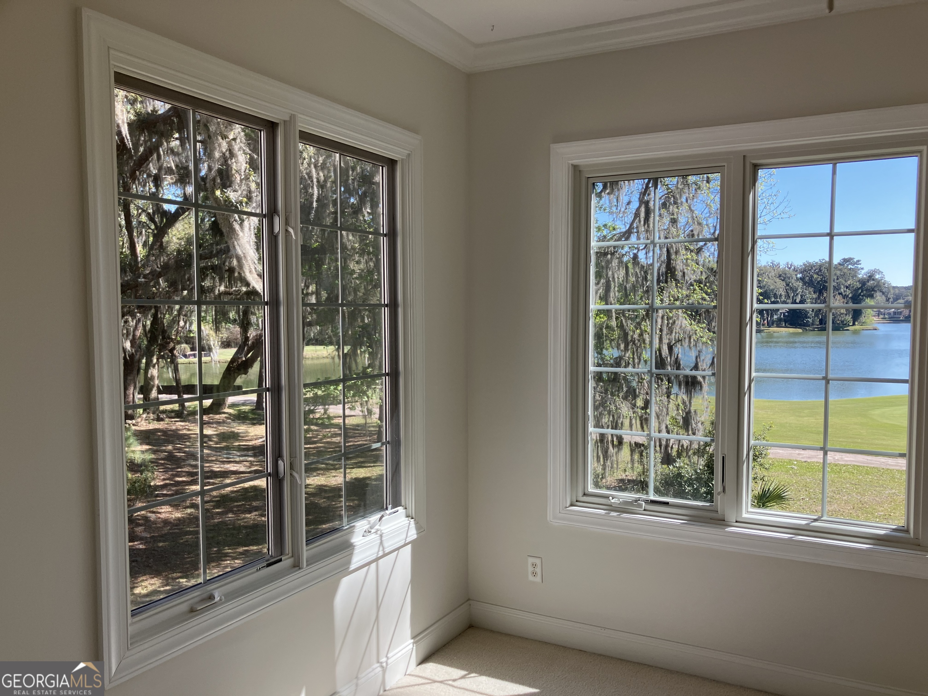 103 Kiln Trail St. Simons Island, GA 31522 - Photo 66 of 81 a view of a room that has a bed and a window