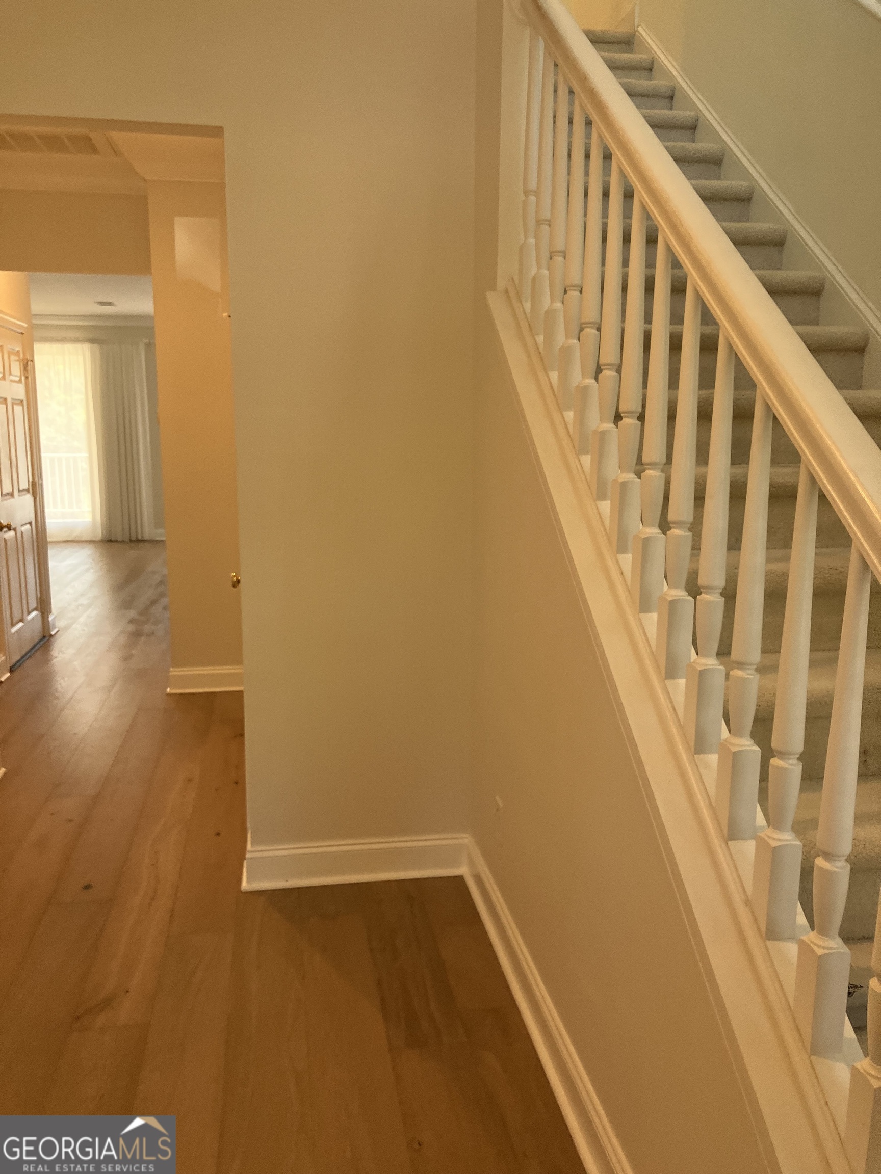 103 Kiln Trail St. Simons Island, GA 31522 - Photo 8 of 81 a view of entryway with wooden floor