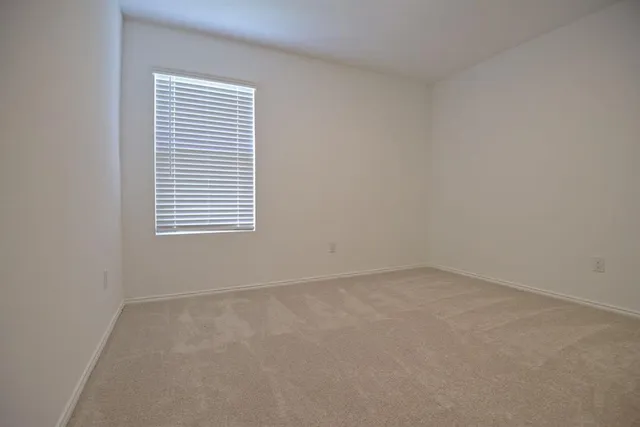 an empty room with a window