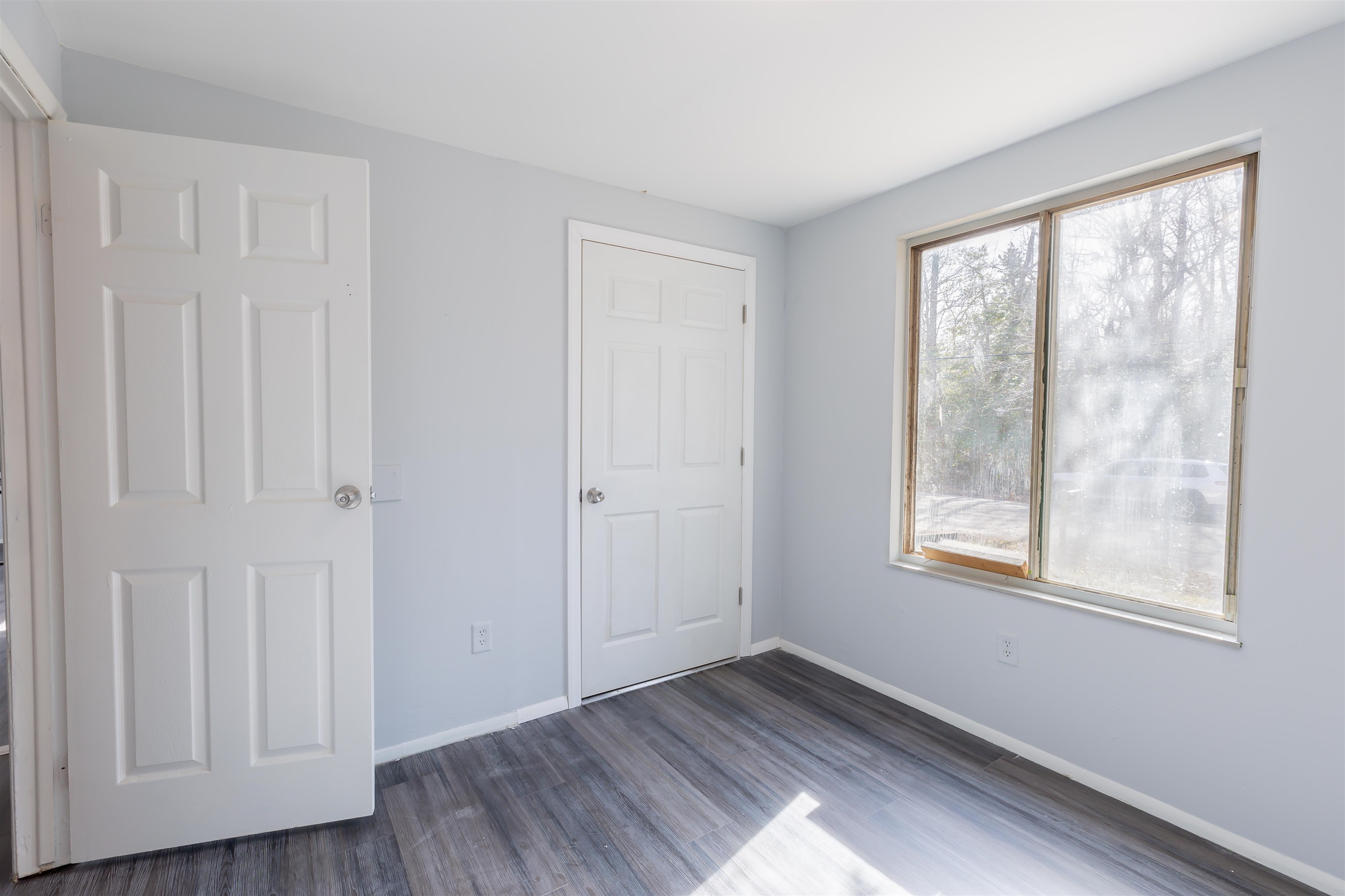 900 East Main Street Rio Grande, NJ 08242 - Photo 16 of 29 a view of an empty room with wooden floor and a window