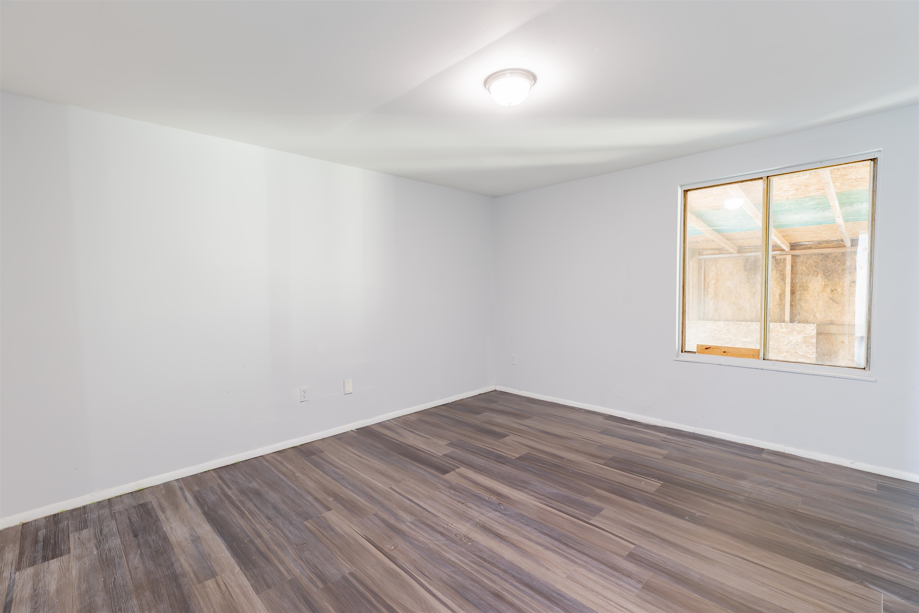 900 East Main Street Rio Grande, NJ 08242 - Photo 21 of 29 an empty room with wooden floor and windows