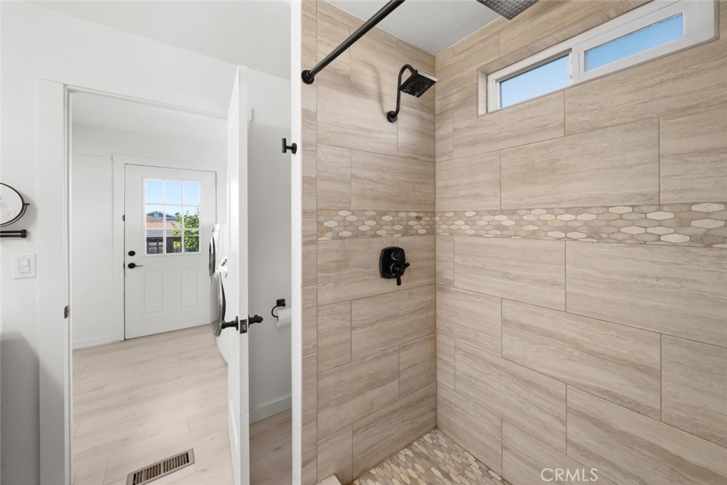 363 North 5th Street Grover Beach, CA 93433 - Photo 26 of 54 a bathroom with a shower