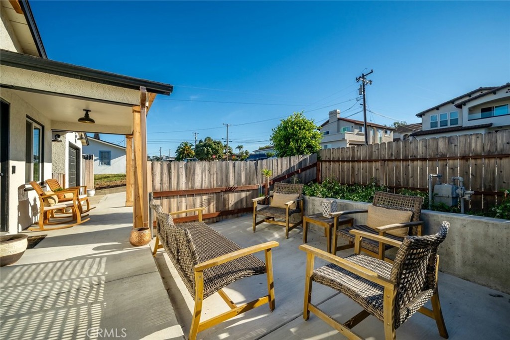 363 North 5th Street Grover Beach, CA 93433 - Photo 37 of 54 a view of a chairs and tables in the patio