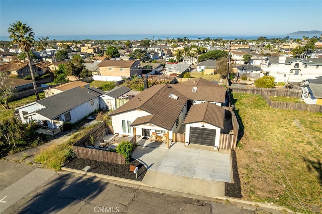 363 North 5th Street Grover Beach, CA 93433 - Photo 49 of 54 an aerial view of residential houses with outdoor space