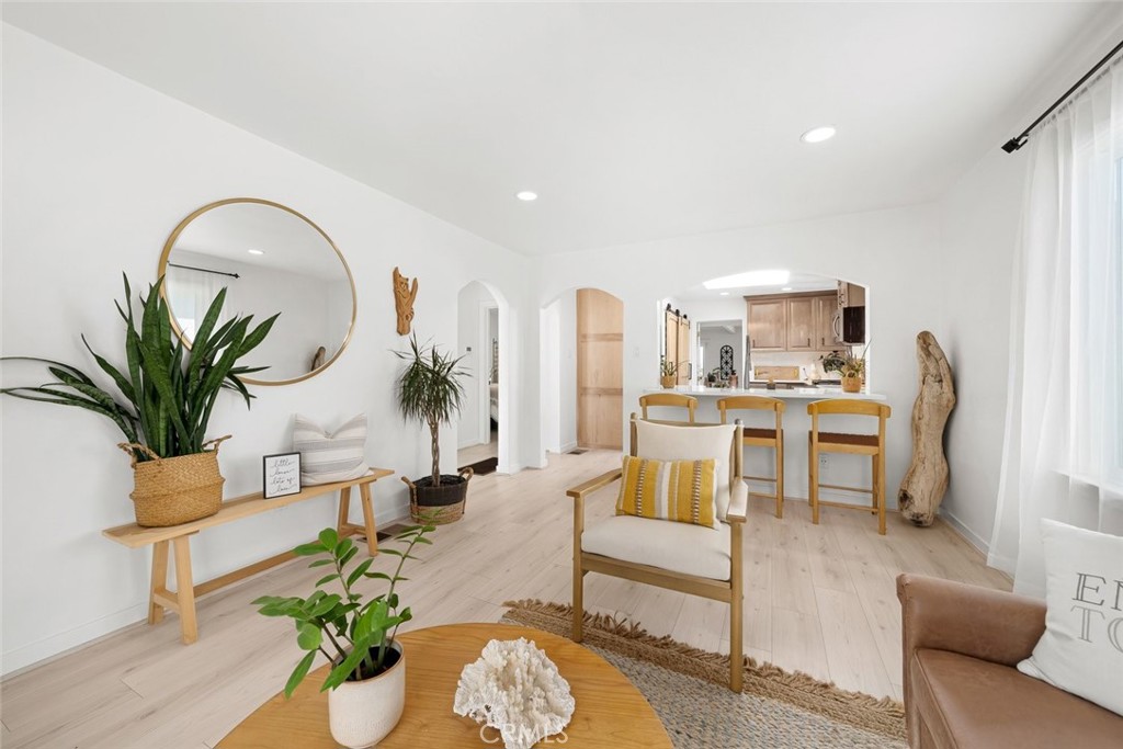 363 North 5th Street Grover Beach, CA 93433 - Photo 5 of 54 a living room with furniture potted plant and a table