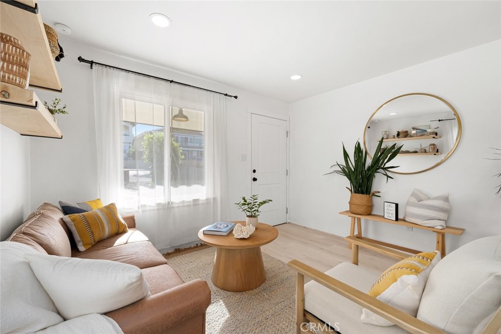 363 North 5th Street Grover Beach, CA 93433 - Photo 6 of 54 a living room with furniture flowerpot and window