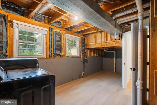 a workspace with furniture and window