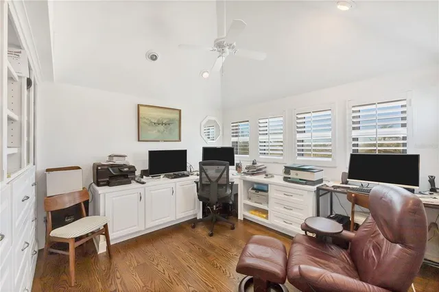a en suite bathroom with a double vanity sink a mirror and a bathtub