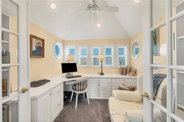 a spacious bathroom with a double vanity sink mirror and bathtub