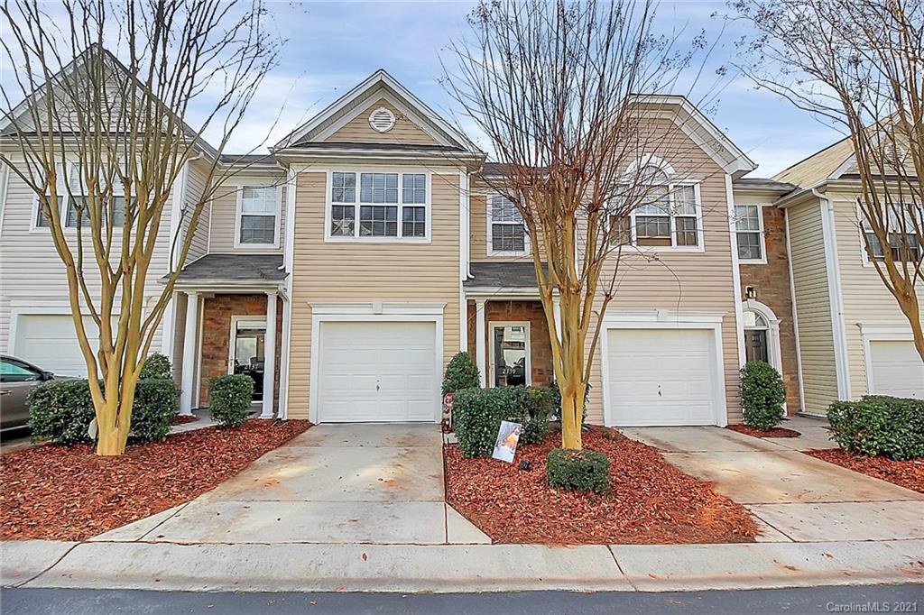 2139 Midnight Blue Lane Fort Mill, SC 29708 - Photo 1 of 23 a front view of a house with garden
