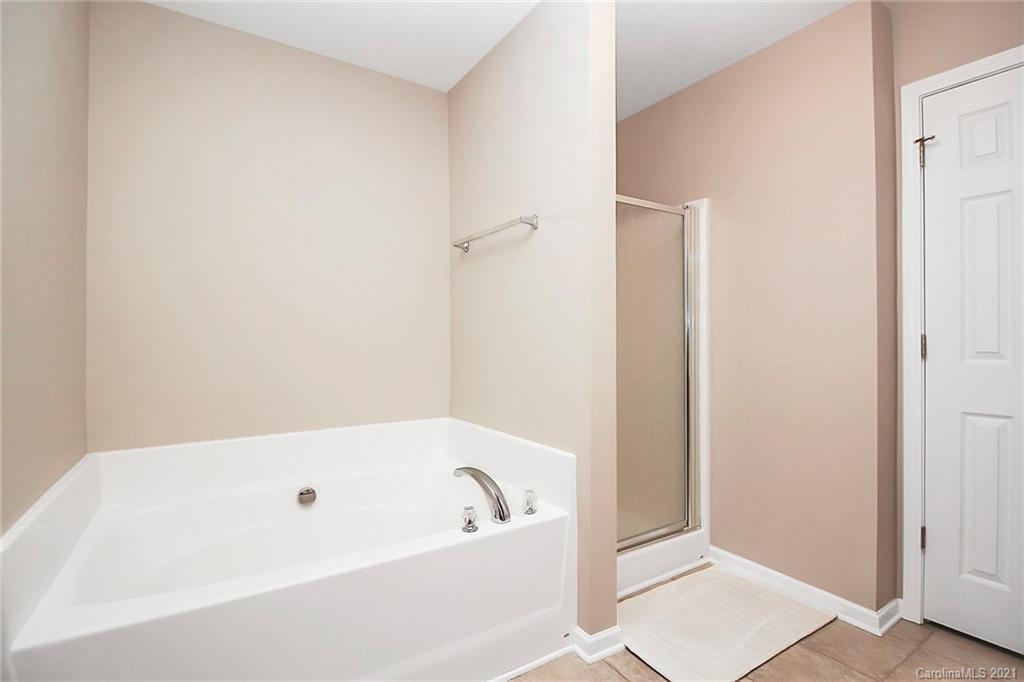 2139 Midnight Blue Lane Fort Mill, SC 29708 - Photo 17 of 23 a bathroom with a bathtub