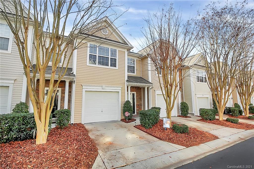 2139 Midnight Blue Lane Fort Mill, SC 29708 - Photo 23 of 23 a front view of a house with garden