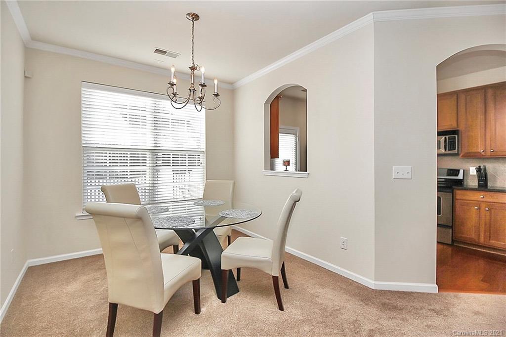 2139 Midnight Blue Lane Fort Mill, SC 29708 - Photo 8 of 23 a view of a dining room with furniture window and outside view