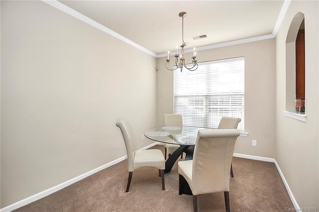 2139 Midnight Blue Lane Fort Mill, SC 29708 - Photo 9 of 23 a view of a dining room with furniture window and outside view
