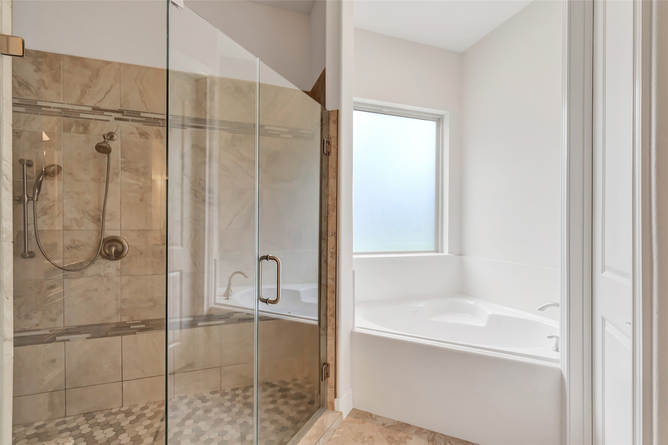 229 Sundog Road Huntsville, TX 77340 - Photo 38 of 50 A view of the large shower and soaking garden tub